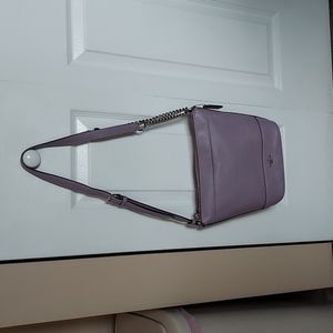 Like new coach bucket bag, lilac, rarely used, no stains or wear marks.